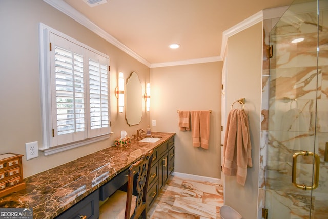 bathroom featuring vanity, ornamental molding, and a shower with door