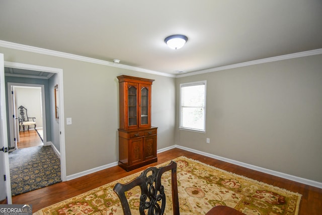 interior space with crown molding and dark hardwood / wood-style flooring