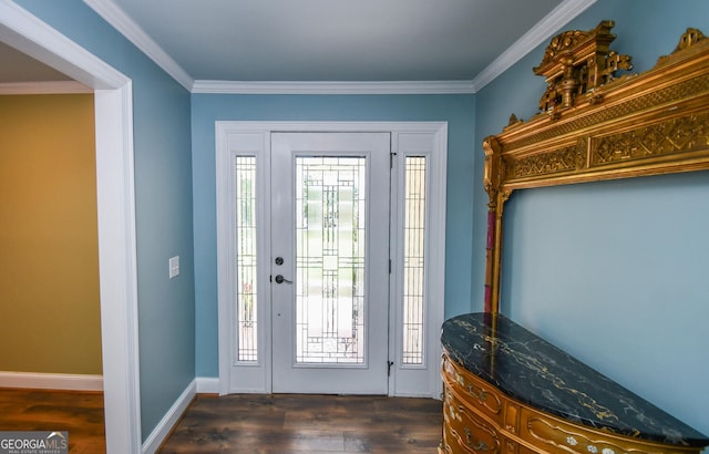 entrance foyer featuring ornamental molding and dark hardwood / wood-style floors