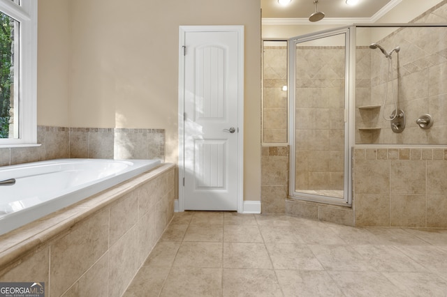 bathroom featuring independent shower and bath, tile patterned flooring, a healthy amount of sunlight, and crown molding