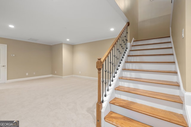 stairway with carpet flooring