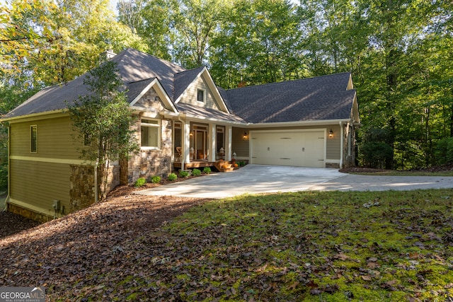 view of front of property with a garage and a porch