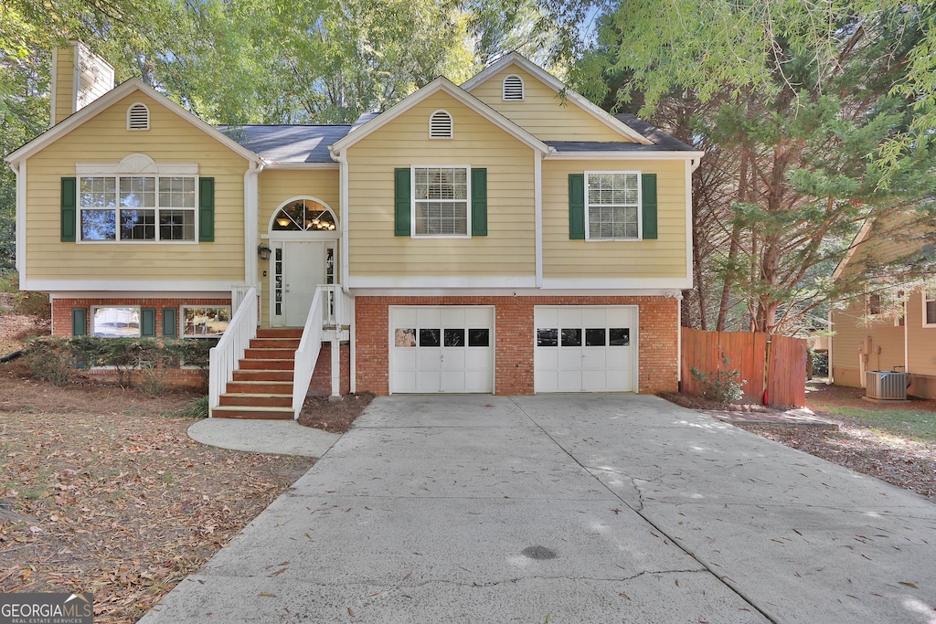 bi-level home featuring a garage