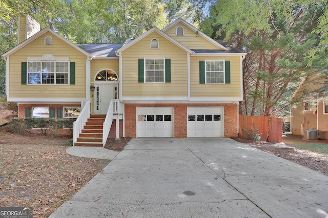 bi-level home featuring a garage