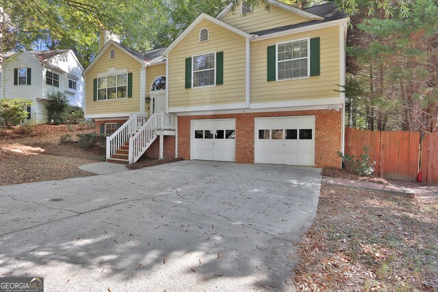 bi-level home featuring a garage