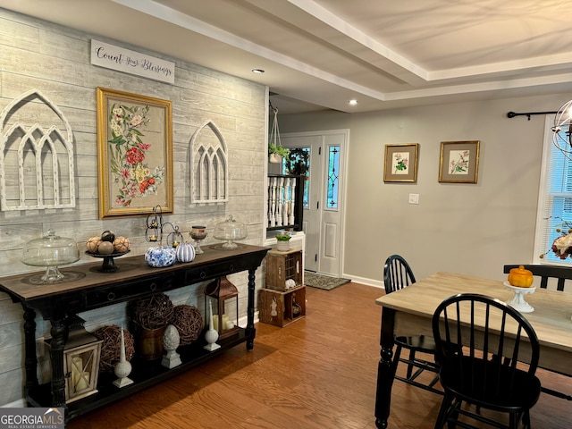 dining space featuring wood-type flooring