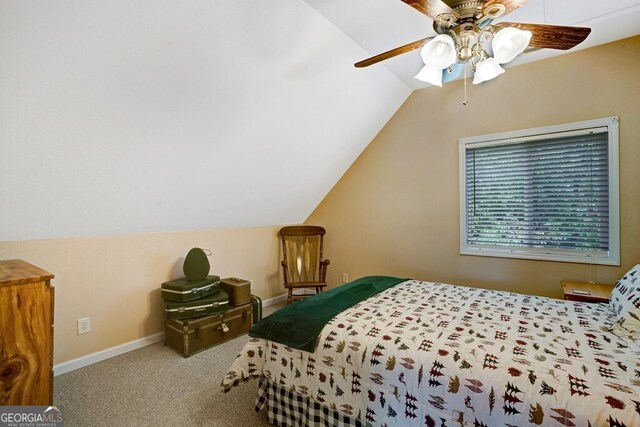 carpeted bedroom with lofted ceiling and ceiling fan