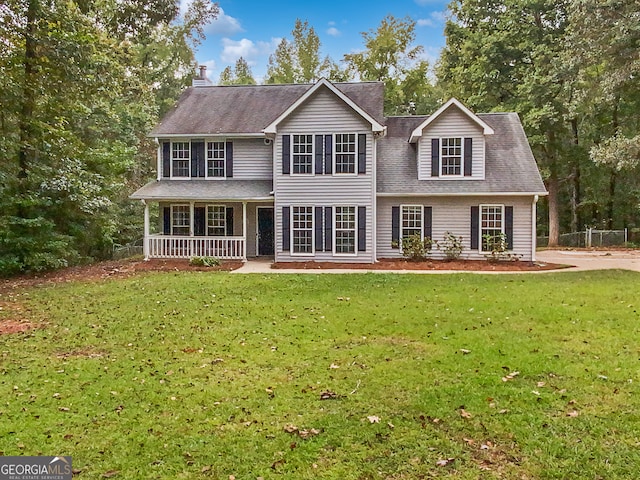 view of front of property featuring a porch and a front lawn