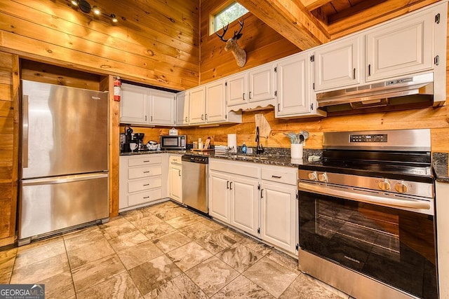 kitchen with white cabinetry, stainless steel appliances, beam ceiling, range hood, and sink