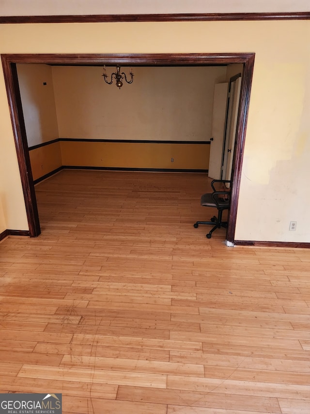 hall with light wood-type flooring