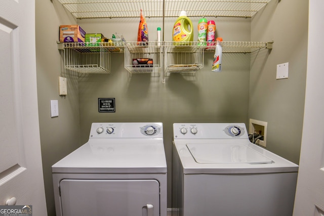 laundry room with independent washer and dryer