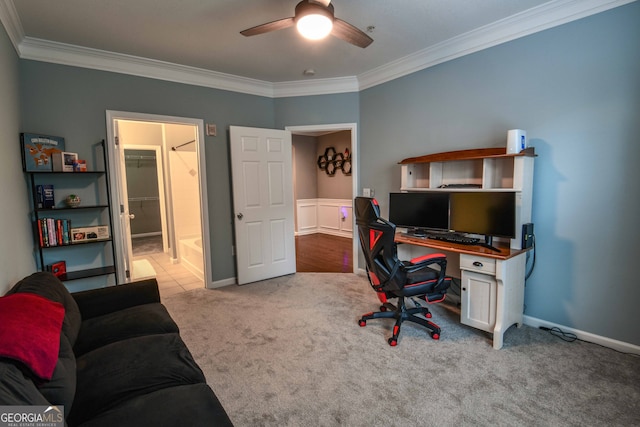 office space with light carpet, crown molding, and ceiling fan