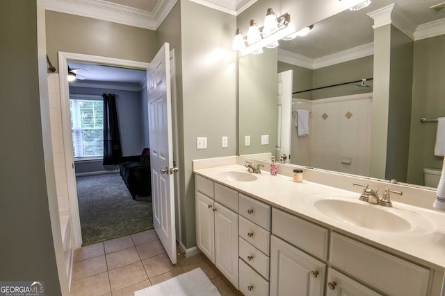 bathroom featuring crown molding, tile patterned flooring, vanity, and toilet