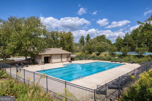 view of pool featuring a patio