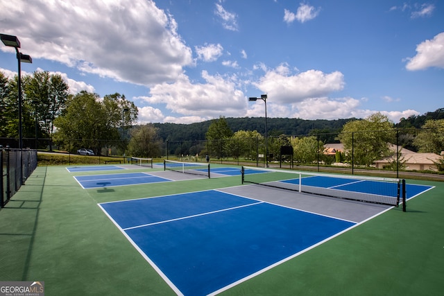 view of sport court featuring basketball court