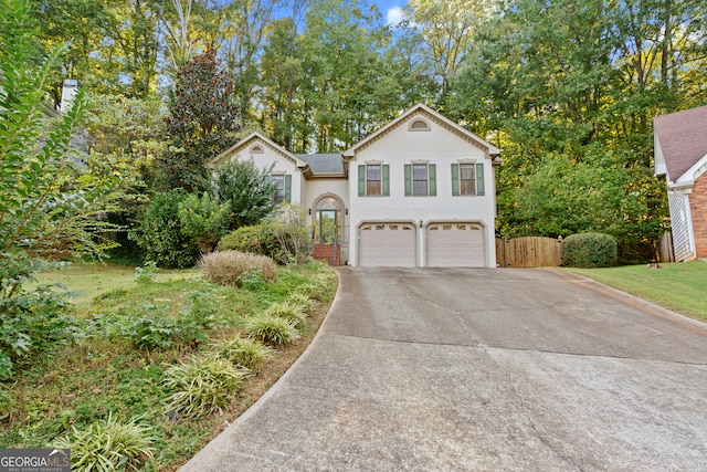 view of front of property featuring a garage