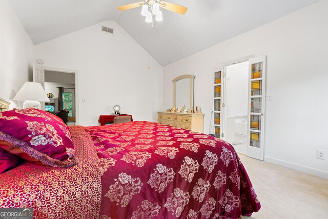 bedroom with light colored carpet, high vaulted ceiling, and ceiling fan