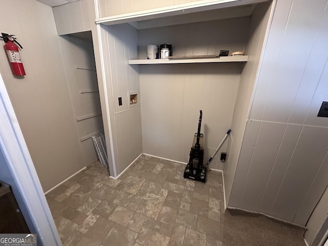 clothes washing area featuring washer hookup