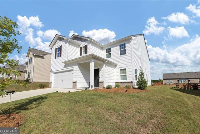 view of front facade with a front lawn and a garage