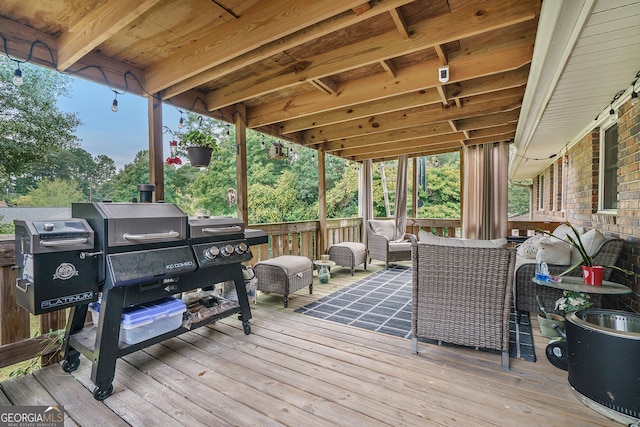 wooden deck with an outdoor hangout area