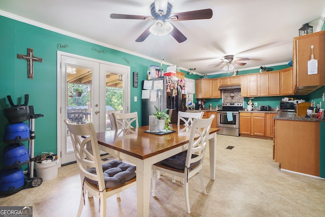 dining room with crown molding, ceiling fan, and french doors