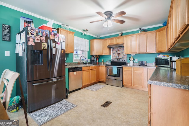 kitchen with ceiling fan, appliances with stainless steel finishes, and crown molding