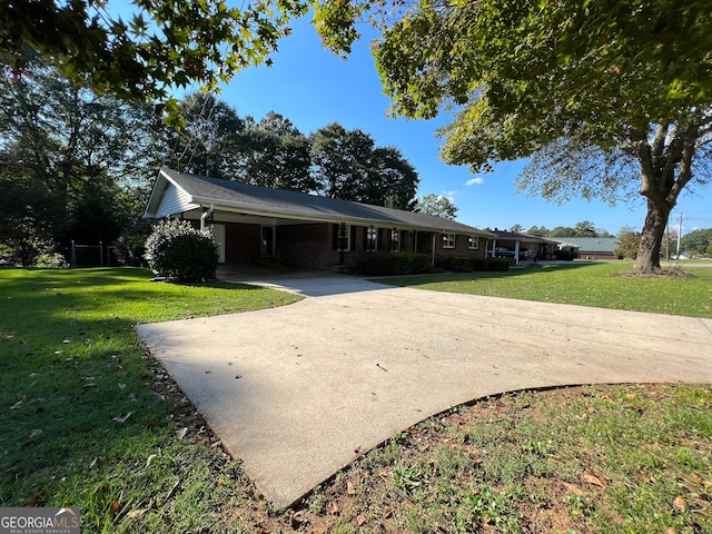 view of front of home with a front lawn