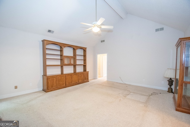 unfurnished living room with ceiling fan, light carpet, beam ceiling, and high vaulted ceiling