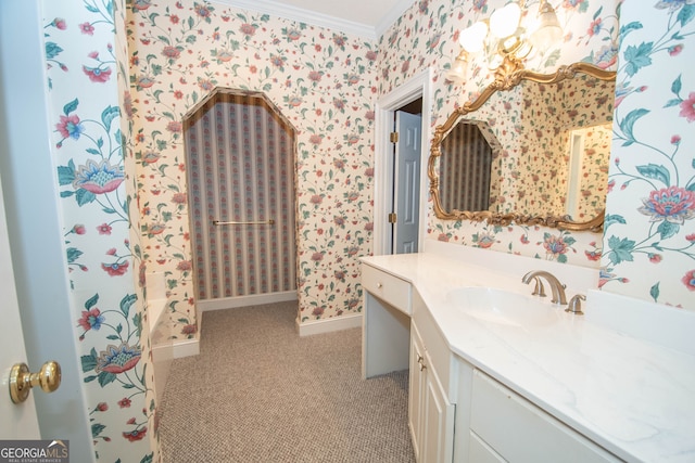 bathroom with crown molding and vanity