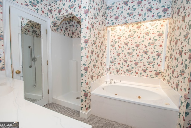 bathroom featuring vanity and separate shower and tub