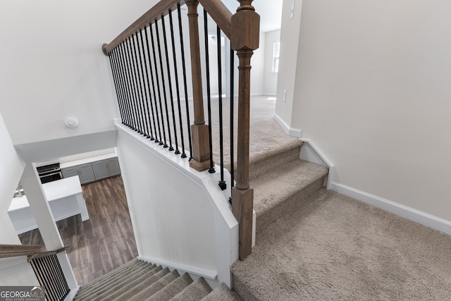 stairway with carpet flooring