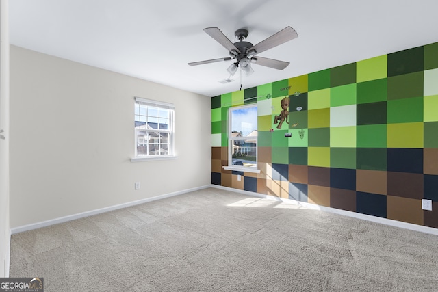 unfurnished bedroom featuring ceiling fan and light carpet