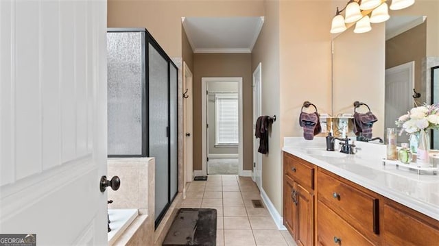 bathroom featuring vanity, independent shower and bath, crown molding, tile patterned flooring, and an inviting chandelier