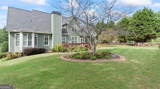 view of yard with a deck