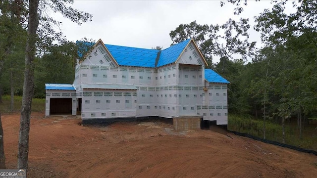 view of property exterior with a garage