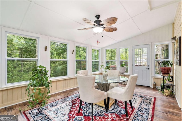 sunroom with a wealth of natural light and ceiling fan