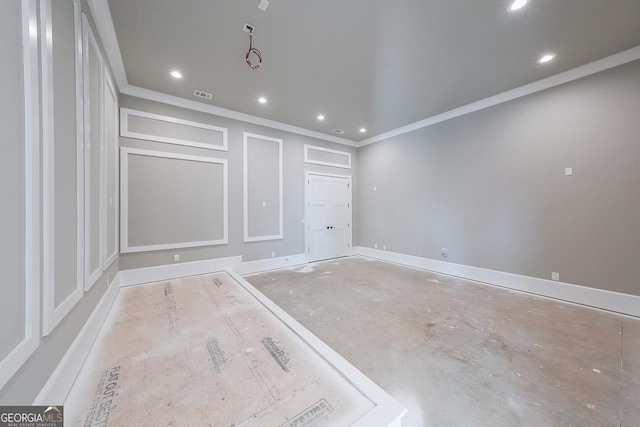 spare room featuring ornamental molding