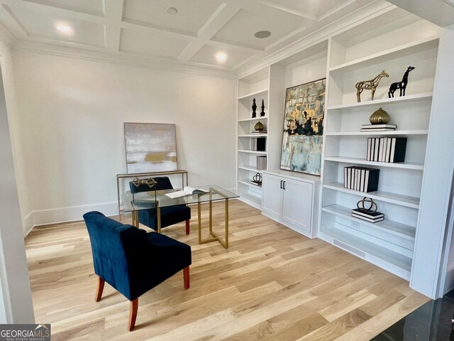 unfurnished room featuring built in features, light wood-type flooring, and coffered ceiling