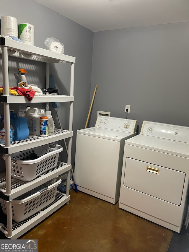 washroom featuring washer and dryer