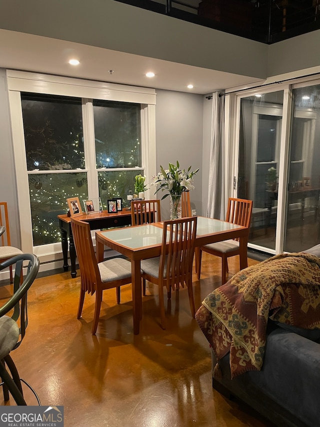 dining area with concrete floors