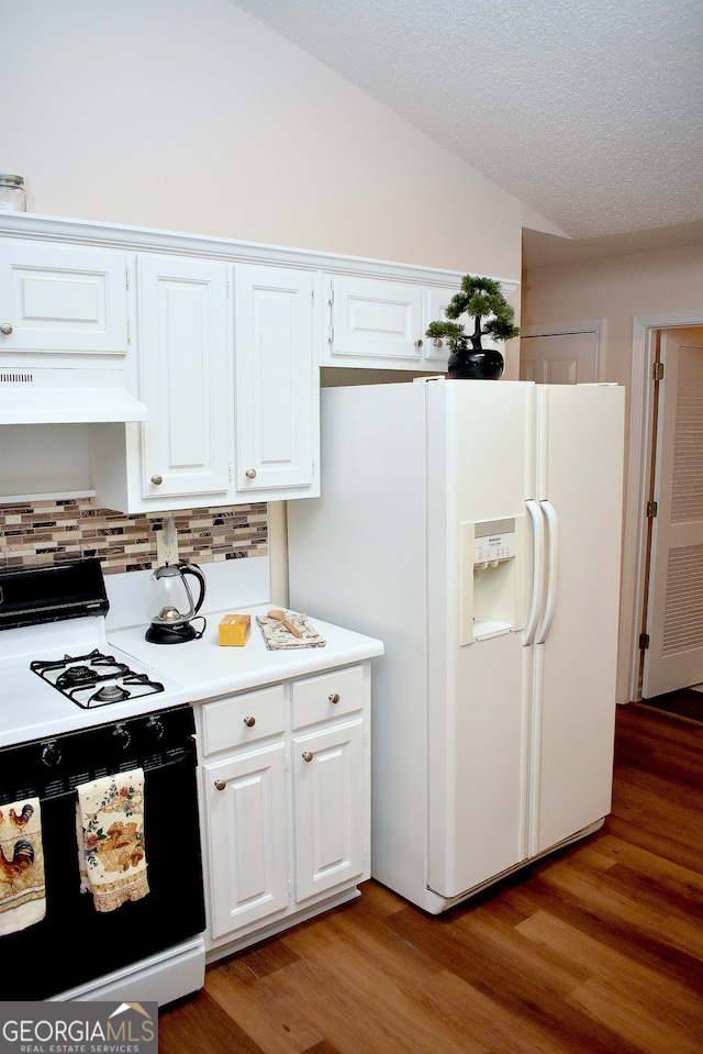 kitchen featuring white appliances, wood-type flooring, white cabinetry, exhaust hood, and vaulted ceiling