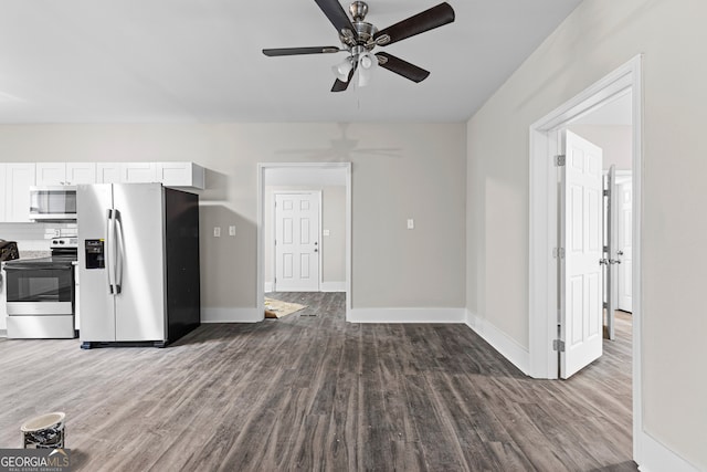 kitchen with white cabinetry, dark hardwood / wood-style flooring, ceiling fan, and stainless steel appliances