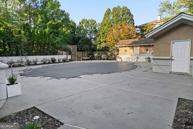 view of swimming pool with a patio and area for grilling