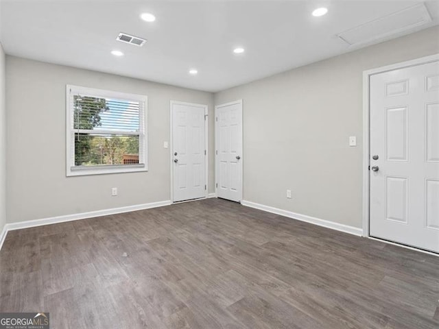 foyer entrance with dark hardwood / wood-style flooring