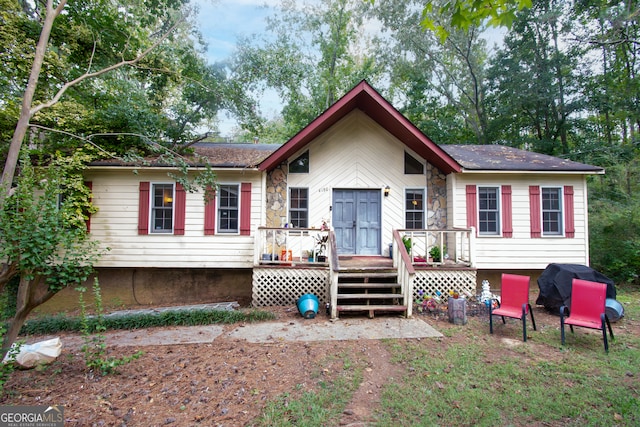 view of front of property featuring a deck