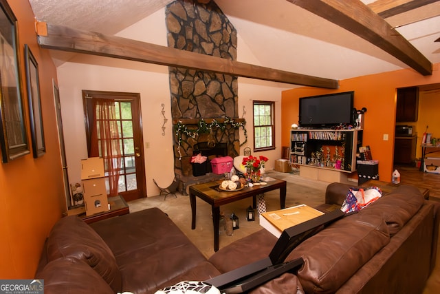 living room featuring light carpet, a fireplace, and lofted ceiling with beams