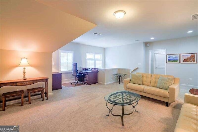 living room with light carpet