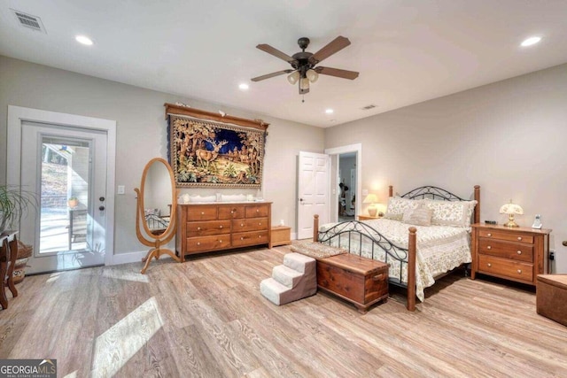 bedroom with ceiling fan, light hardwood / wood-style flooring, and access to exterior