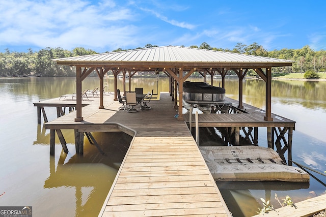 dock area with a water view