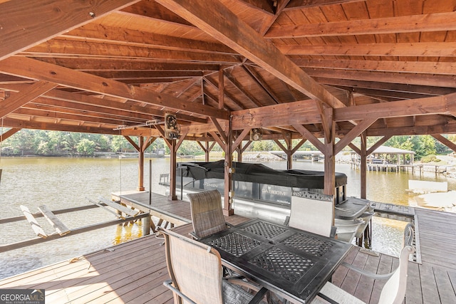 dock area with a water view